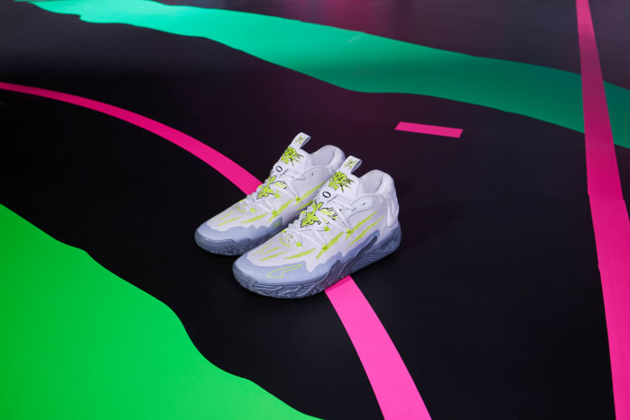 LaMelo Ball's grey and green PUMA sneakers.